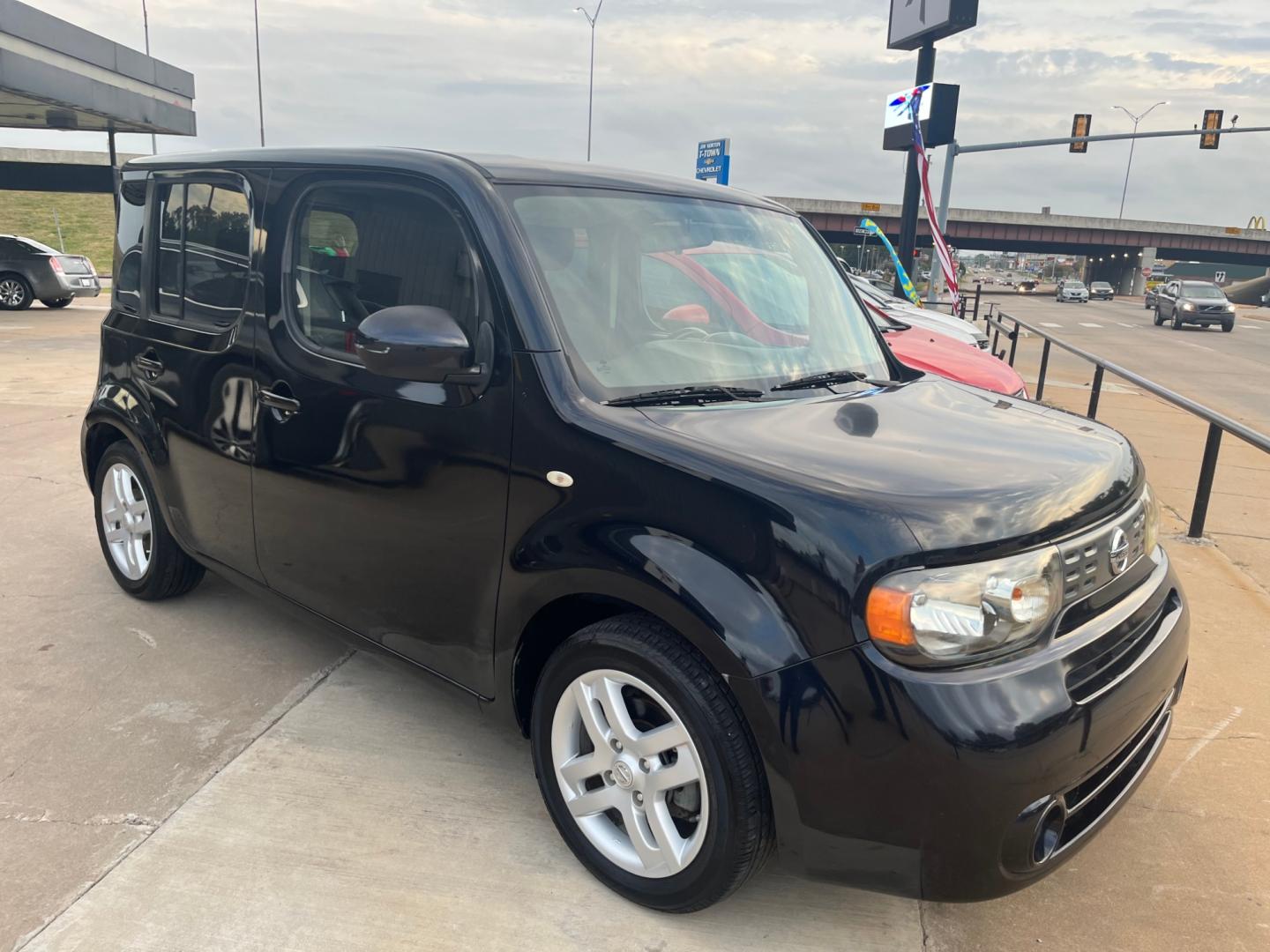 2013 BLACK NISSAN CUBE 1.8 S CVT (JN8AZ2KR9DT) with an 1.8L L4 DOHC 16V engine, Continuously Variable Transmission transmission, located at 8101 E. Skelly Dr., Tulsa, OK, 74129, (918) 592-3593, 36.121891, -95.888802 - Photo#1